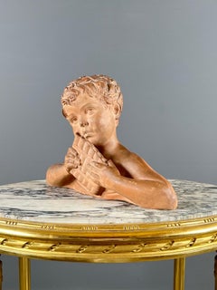 Busto de un niño en terracota, firmado por D. H. Chiparus, siglo XX