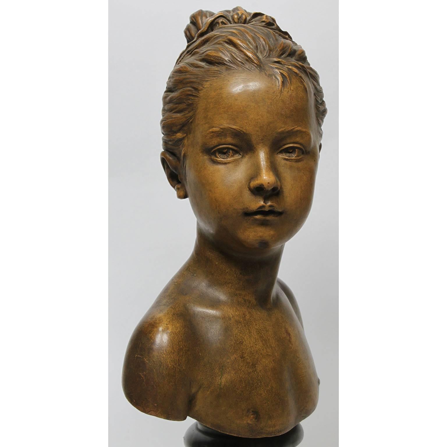 A very fine French 19th century terracotta bust of and Infant Louise Brongniart after Jean-Antoine Houdon (French 1741-1828) raised on a later Blue Turquin marble plinth, Paris, circa 1880.

Among the numerous busts Houdon showed at the Salon of