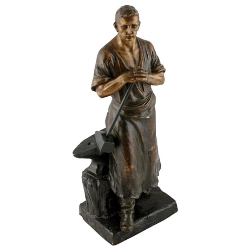 Terracotta Figure of a Blacksmith, 20th Century For Sale
