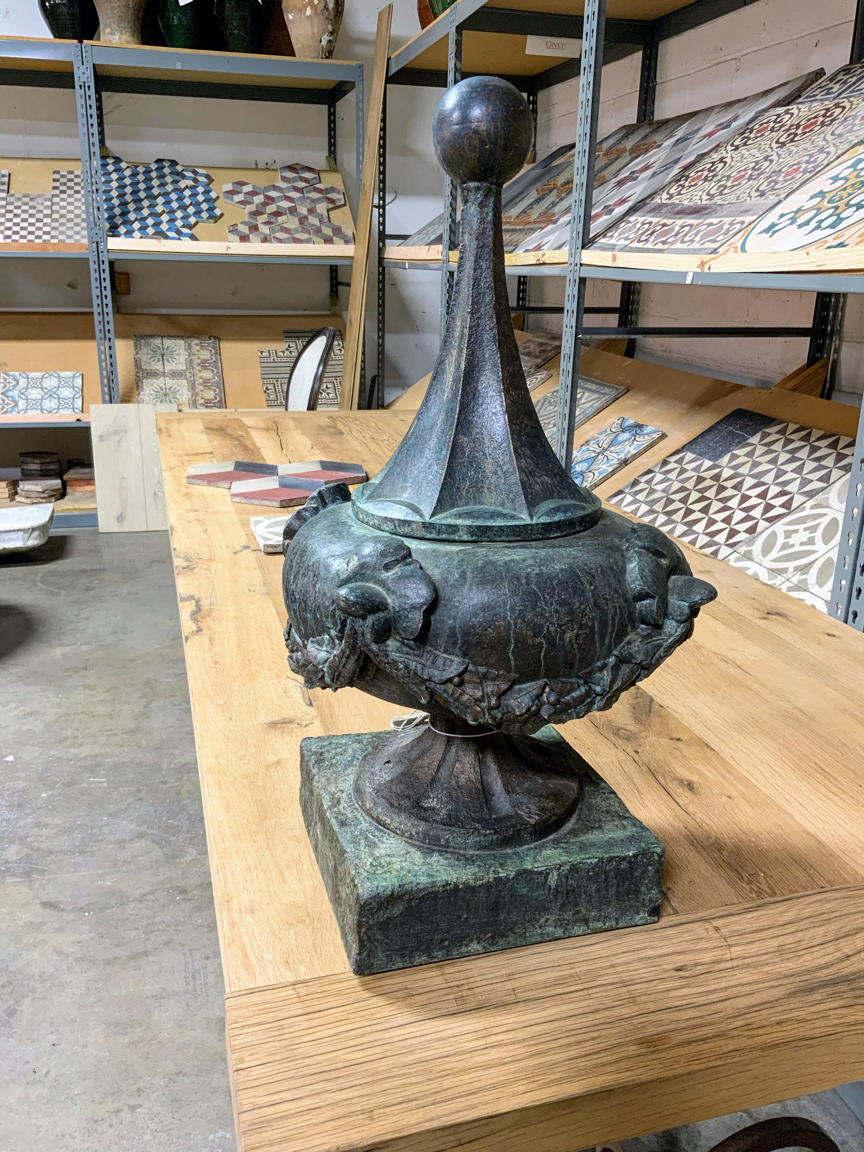 This pair of terracotta finial bronze finished origins from France, circa 1850.