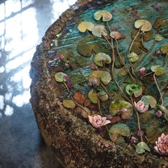 Terracotta, flowers and resin coffee table Il laghetto di Daisy by Manu Crotti