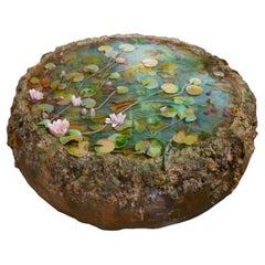 Terracotta, flowers and resin coffee table Il laghetto di Daisy by Manu Crotti
