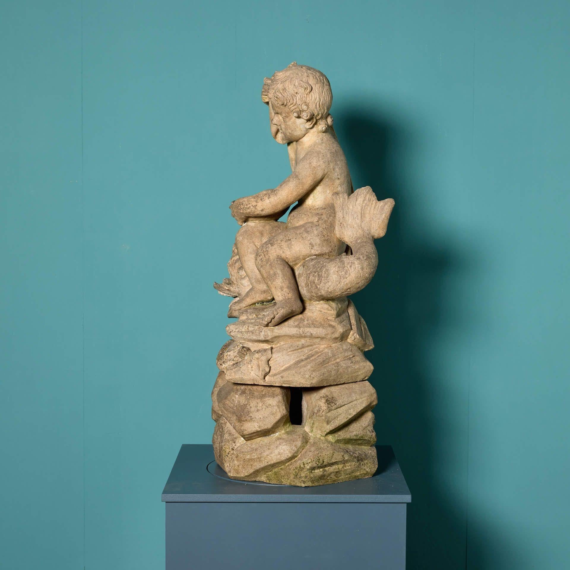 XIXe siècle Fontaine de jardin en terre cuite représentant un garçon et un dauphin en vente