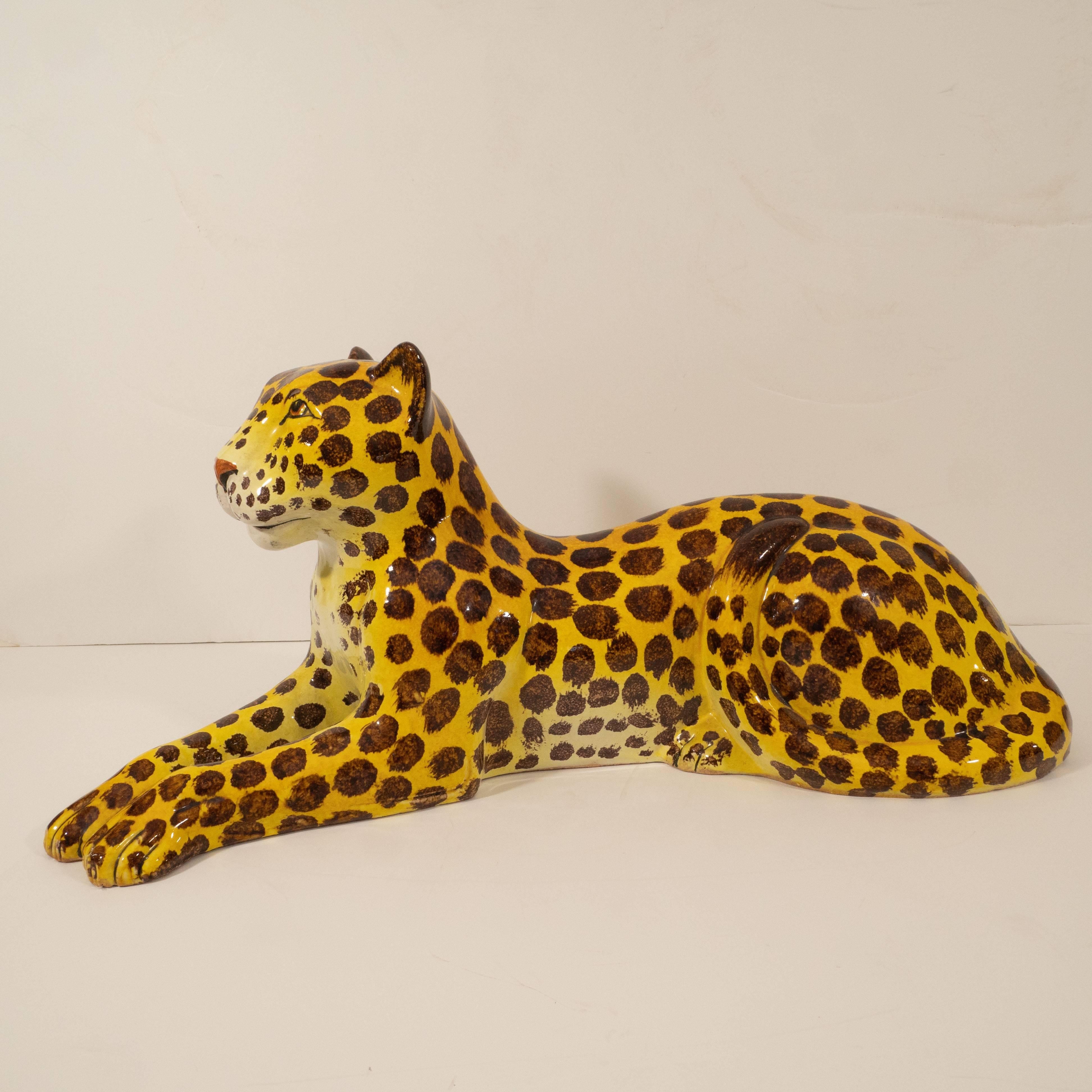 Sometimes adding an animal to the mix makes for a lively interior. This charming leopard, in a resting position, caught our eye with its beautiful color and glaze.