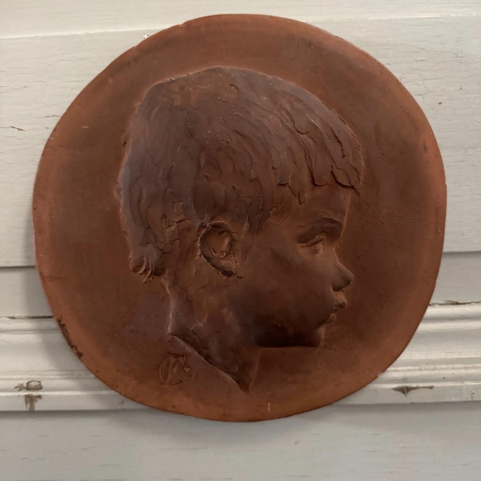 Néoclassique Terracotta medallion by Charles Filleul – Profile of a young child, 20th century en vente