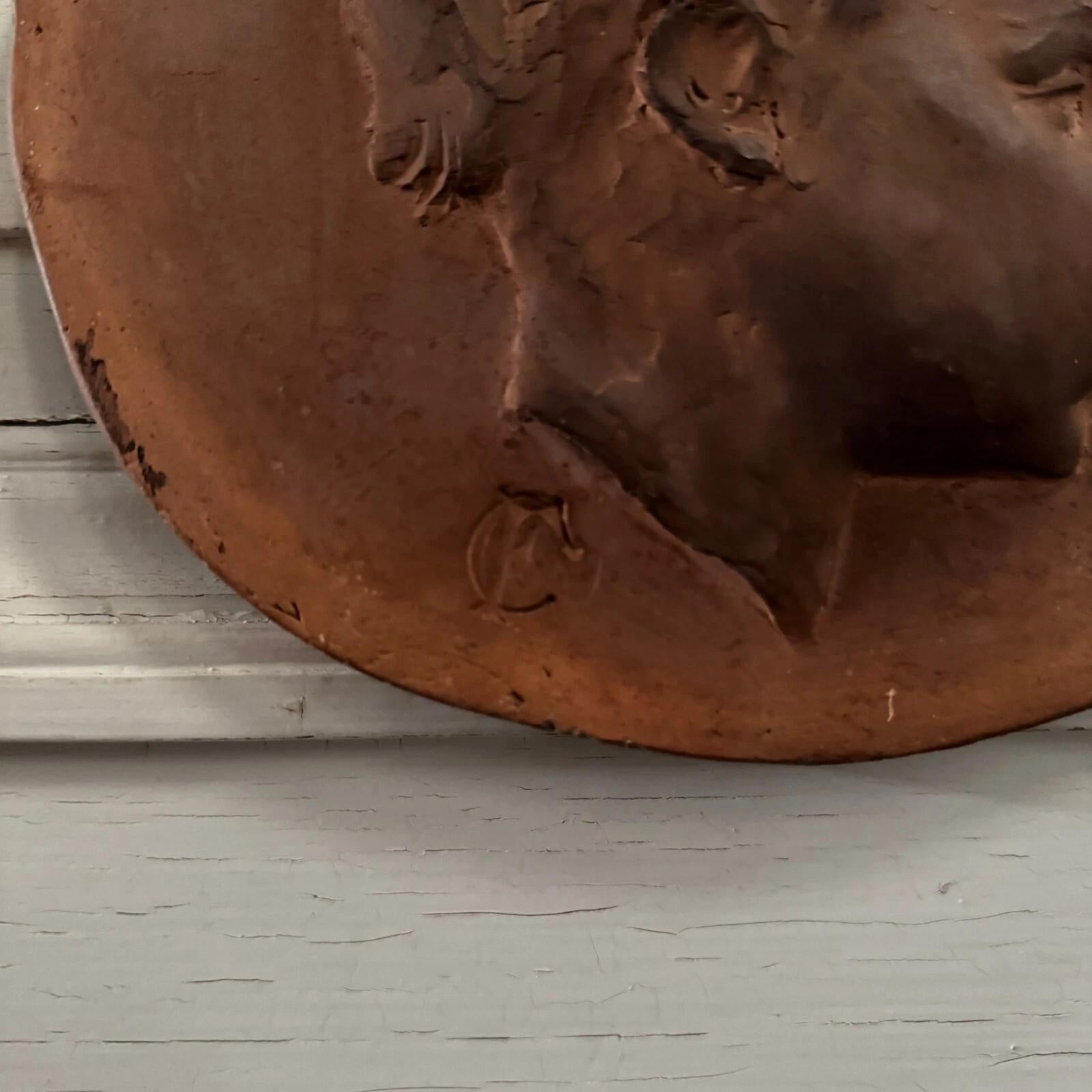 20ième siècle Terracotta medallion by Charles Filleul – Profile of a young child, 20th century en vente