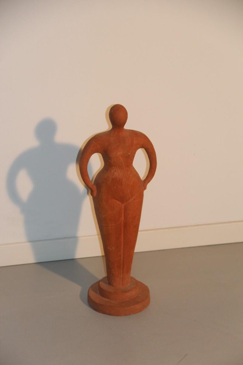 Terracotta nude ceramic sculpture of woman with shapes very reminiscent of Botero style, signed G.Vecchia.