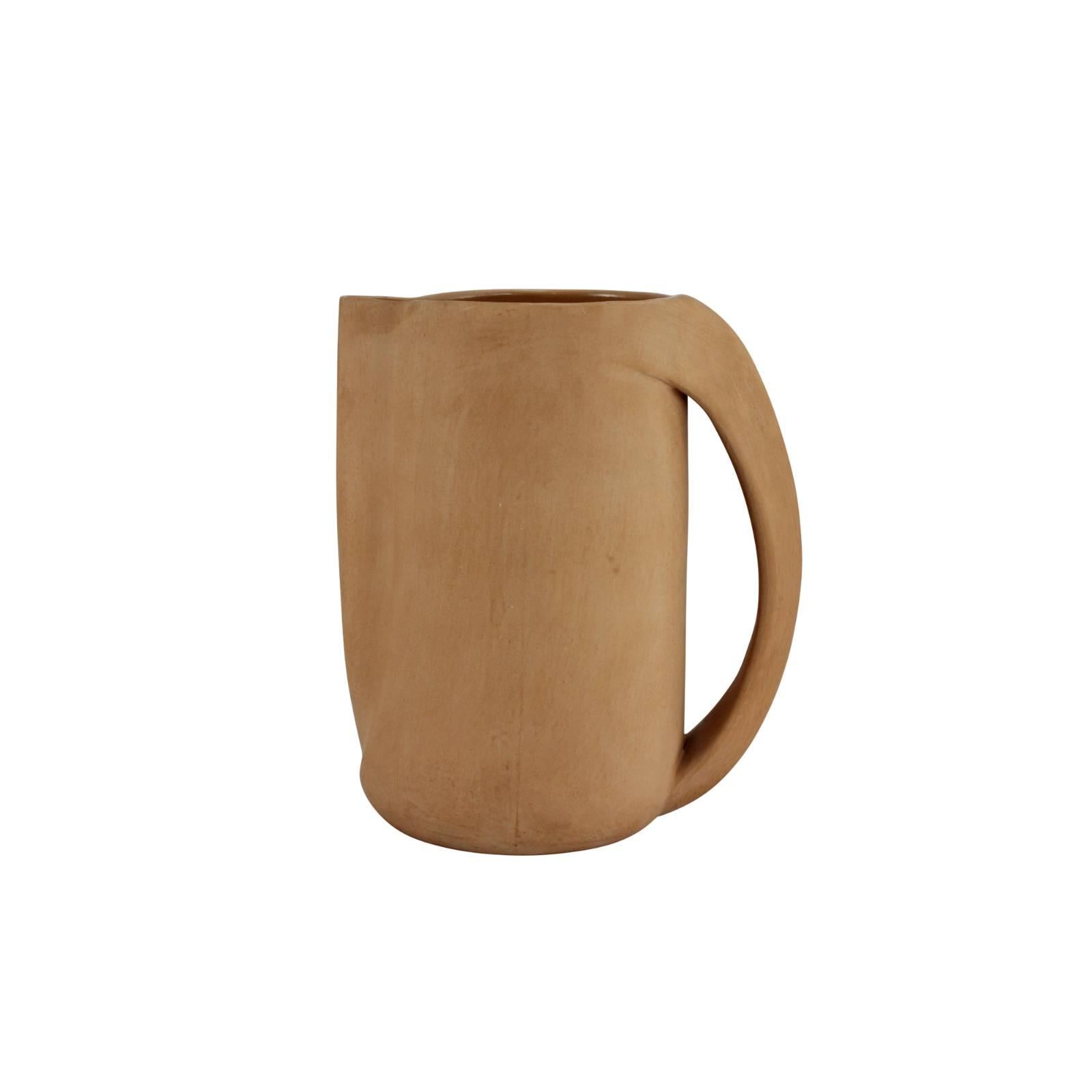 A rare terracotta pitcher by Elsa Peretti for Tiffany and Co, circa 1970s, made in Italy. The interior of the piece is glazed for practical use. The bottom is stamped 