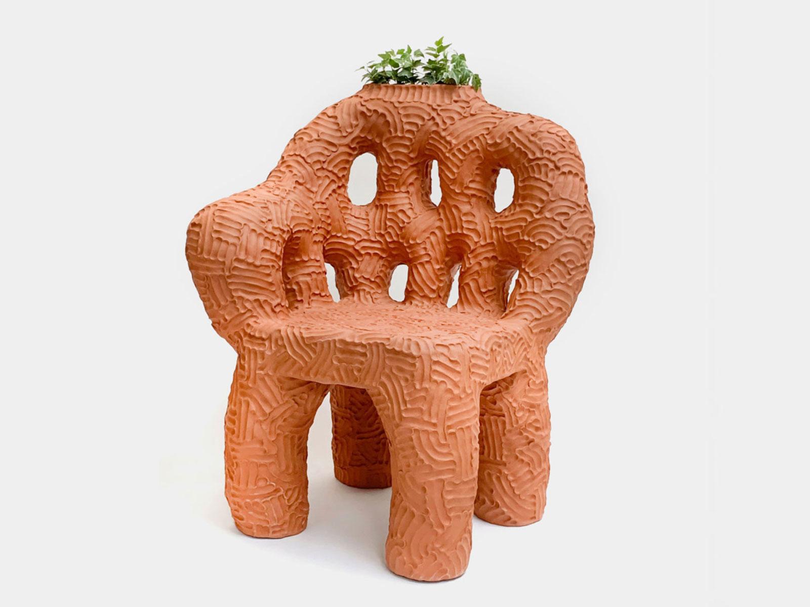 Chair and planter handmade of solid terracotta by New York and Medellín-based artist Chris Wolston. Can be used indoors or outdoors – Please note, this cannot be left outside during the winter months in environments where the temperature falls below