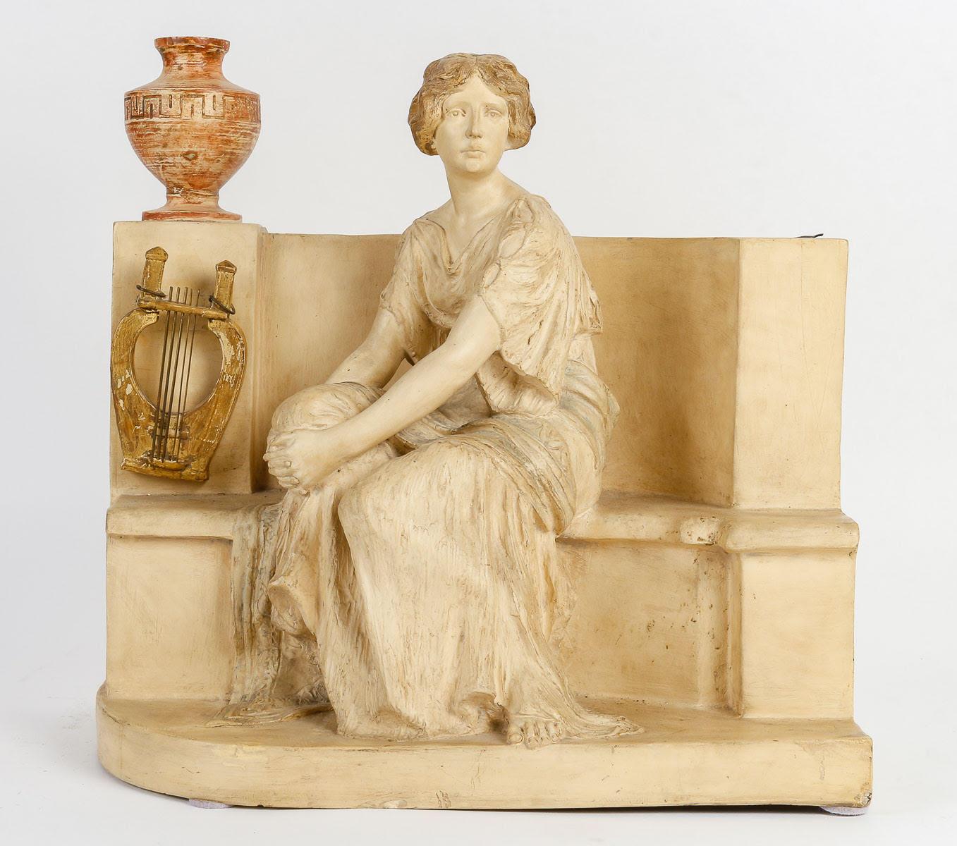 Terracotta planter by Montovany, Art Nouveau.

Terracotta planter by Montovany, Art Nouveau, 1910, restoration to the jug, broken and recoloured, inside of the tub in zinc.  
h: 38cm , w: 40cm, d: 22cm