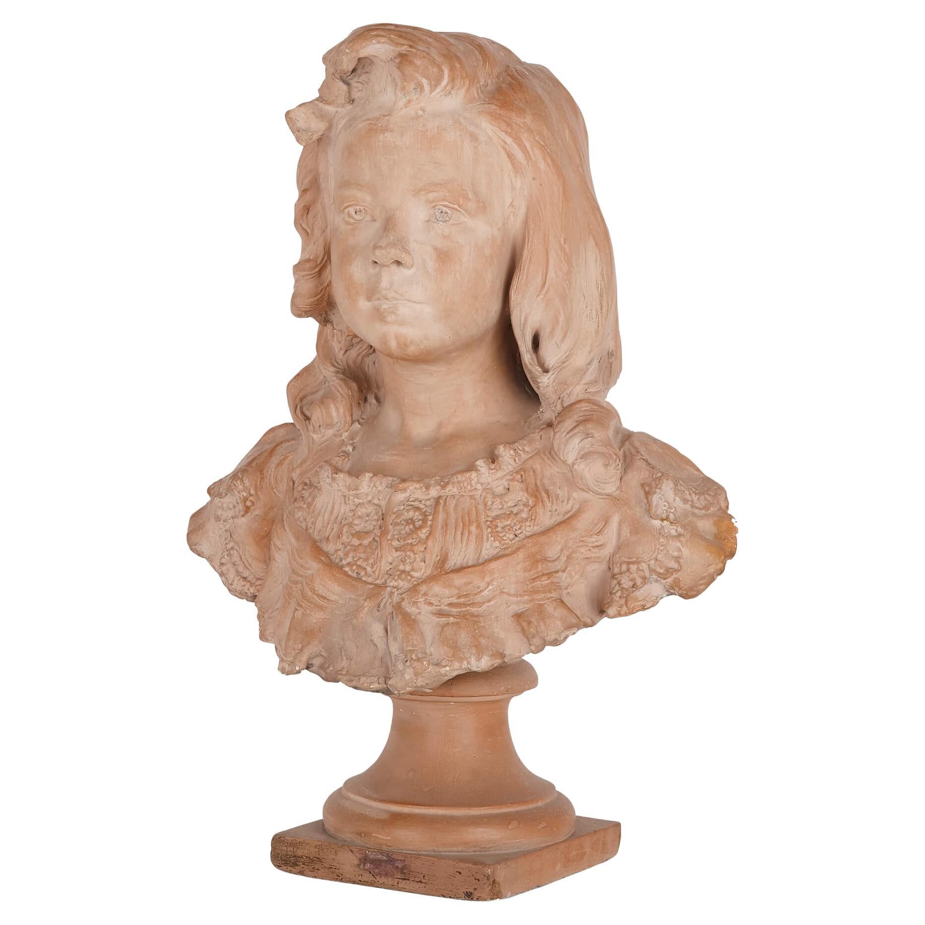 Terracotta portrait bust of a girl by Henri Weigele For Sale