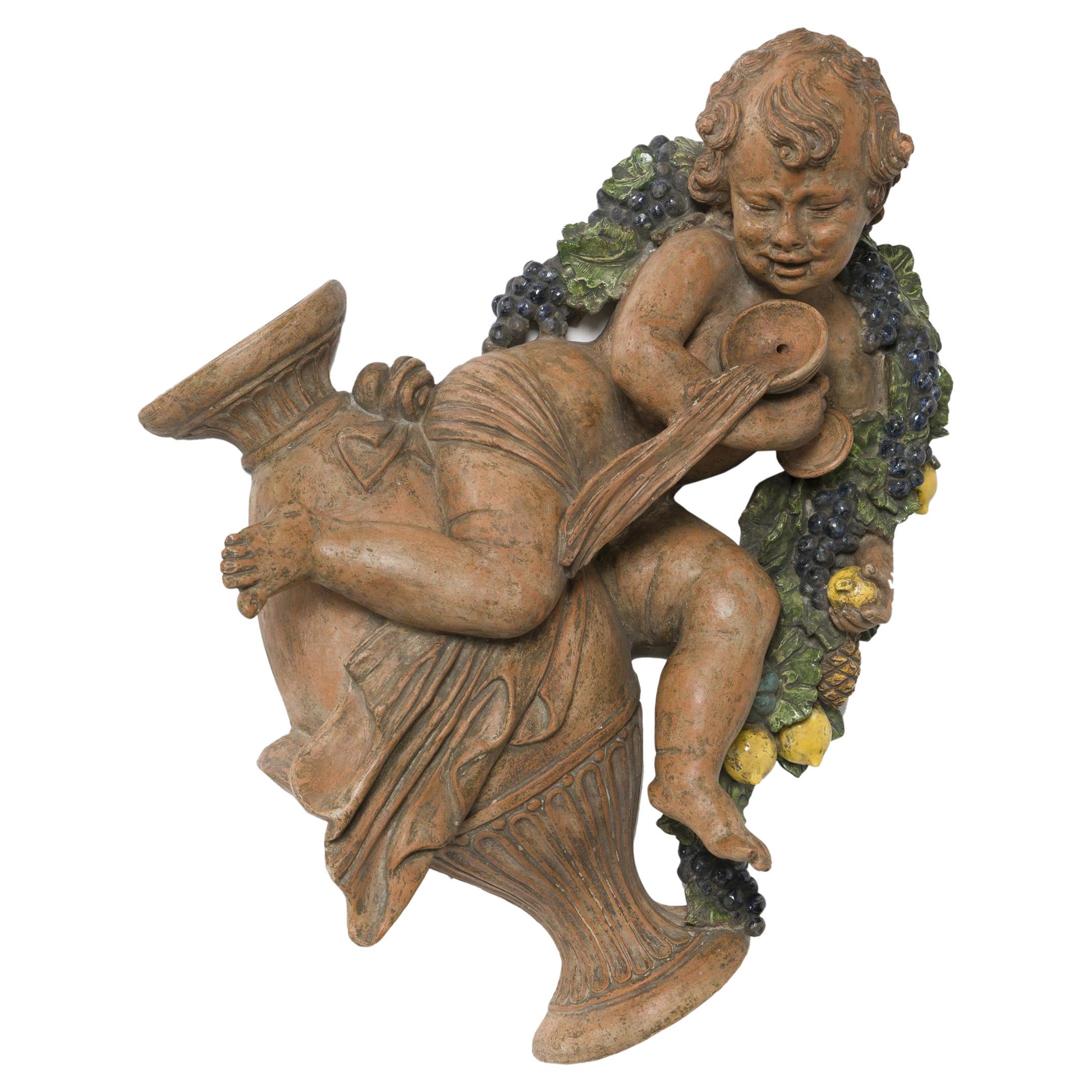 Terracotta putto wall mounts panel, Italian For Sale