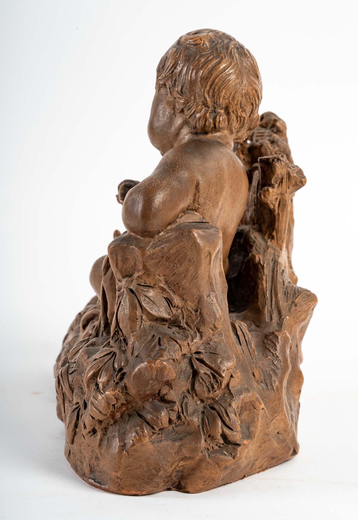 Terracotta Representing a Child and a Bird in the Hand In Good Condition For Sale In Saint-Ouen, FR