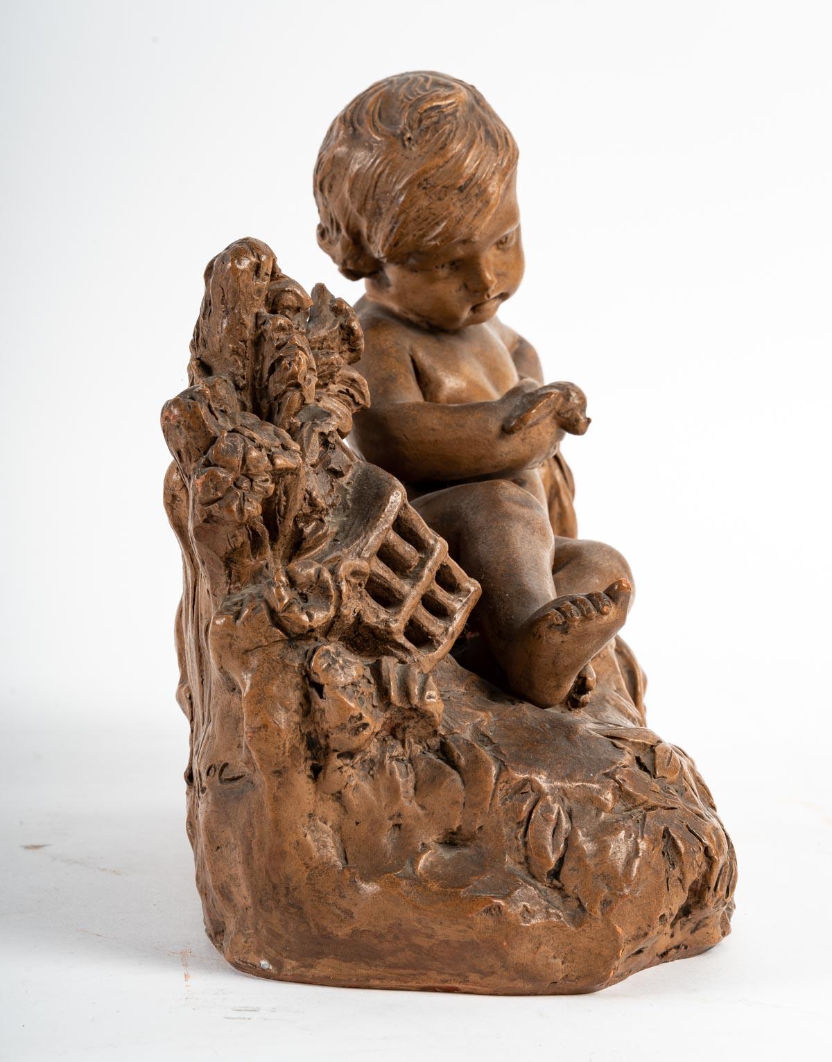Terracotta Representing a Child and a Bird in the Hand For Sale 1