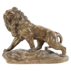 Escultura de terracota de un león, firmada por Armand Fagotto, ca. 1900