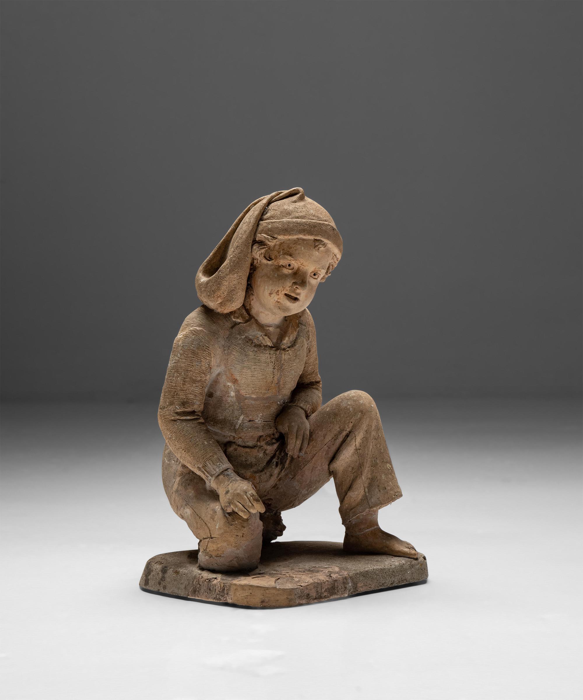 Terracotta Sculpture of a Young Fisherman Playing Marbles, France 1858.

In original condition with beautiful patina, signed E. Blot.