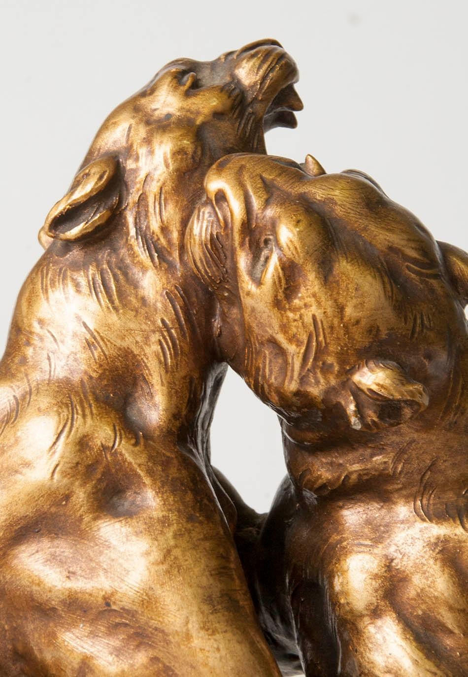 Lively and powerful terracatto statue of two fighting tigers.
The statue is signed on the back 'H. Fagotto.
The statue is patinated with shades of gold and brown, which gives a nice contrasting effect.
The statue was probably made around 1920 in