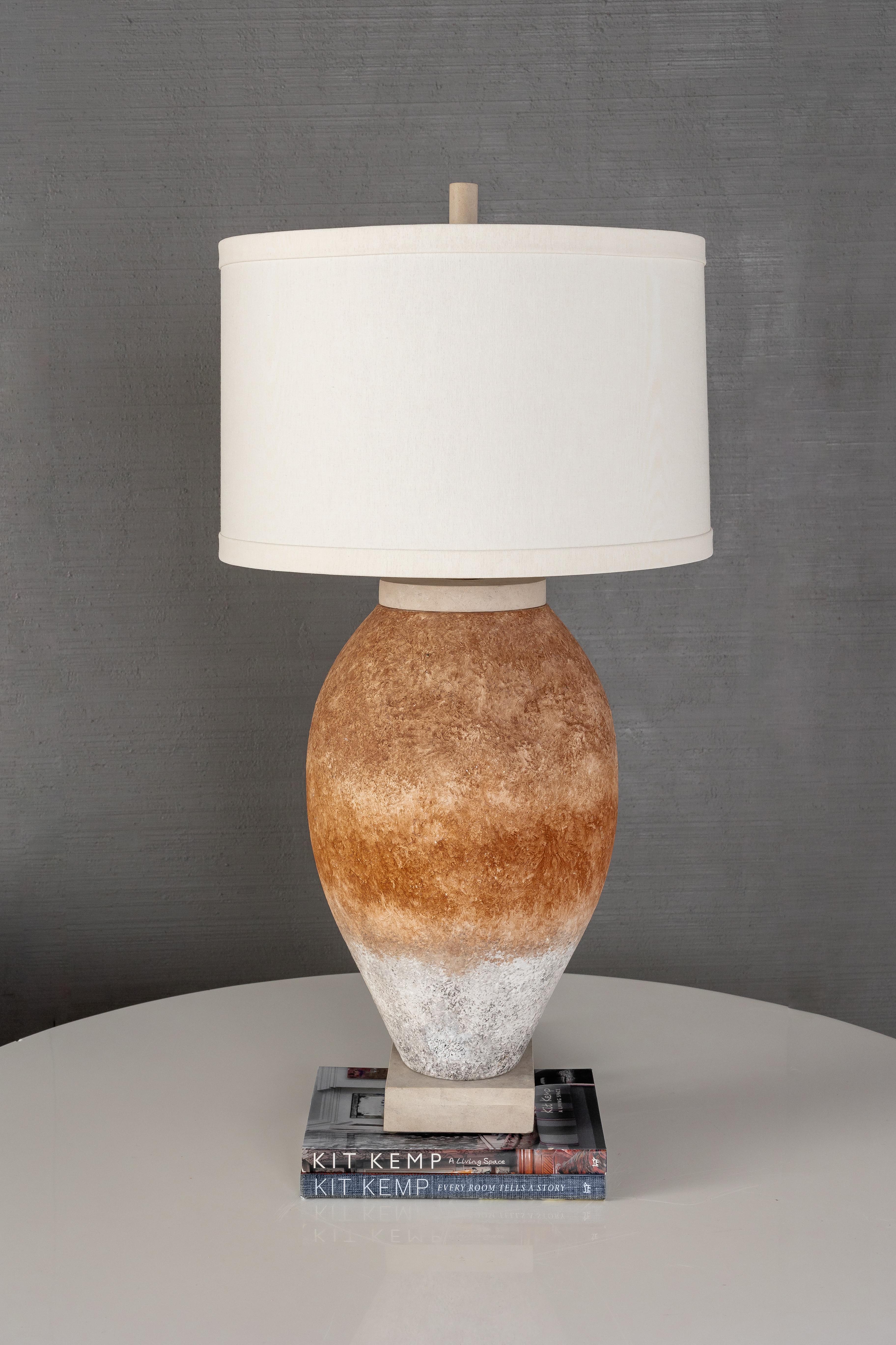 Hand-formed terracotta toned ceramic base.

Designed by Brendan Bass, Hand-Crafted in Northern Italy.

Shade: 18