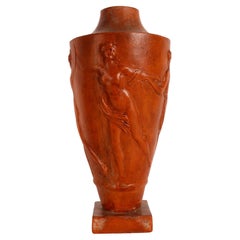 Terracotta vase depicting in relief satyrs and maenads, France 1920.