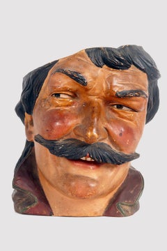 Terracotta vase depicting the head of a man with mustache, Austria 1890.
