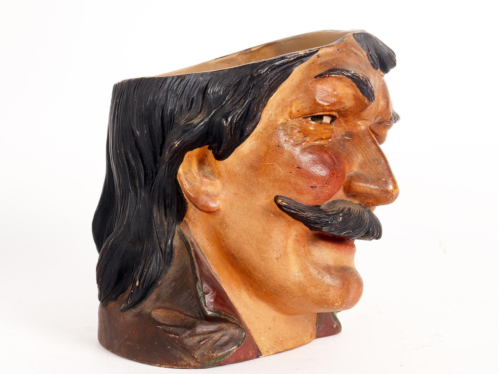 Austrian Terracotta vase depicting the head of a man with mustache, Austria 1890. For Sale
