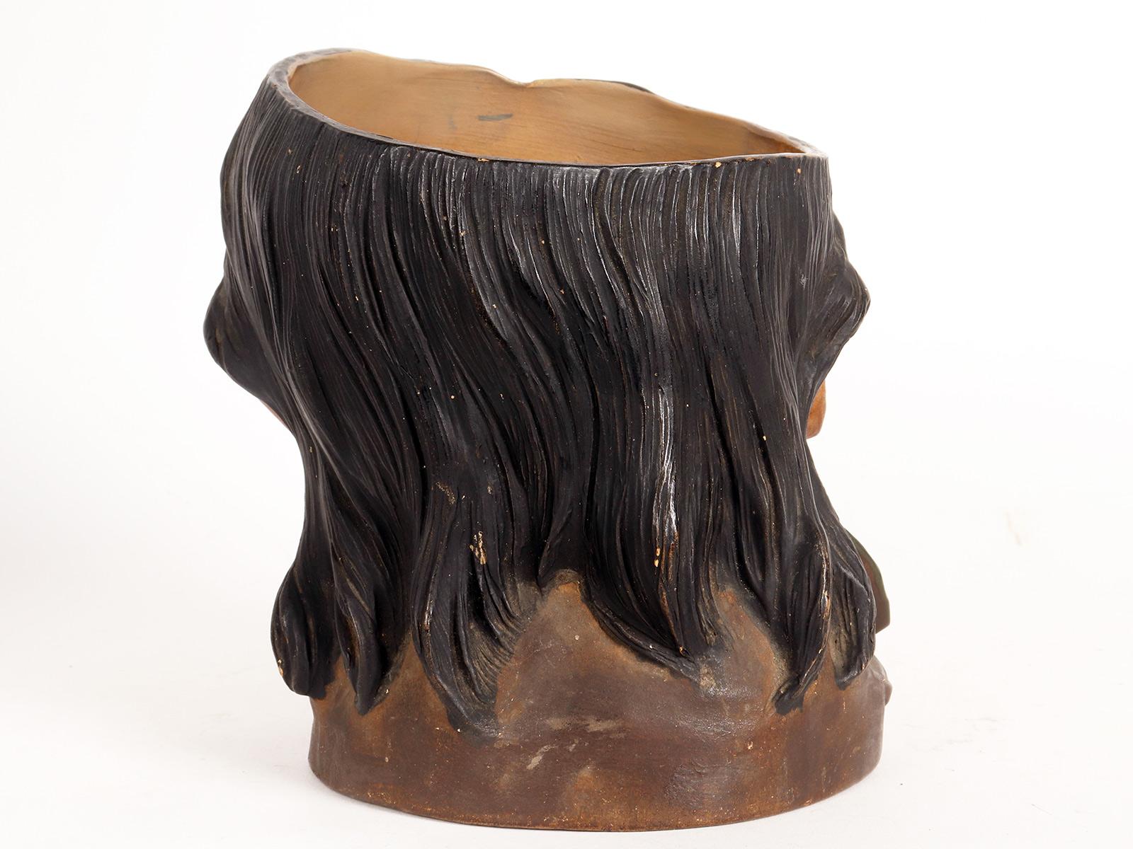 19th Century Terracotta vase depicting the head of a man with mustache, Austria 1890. For Sale