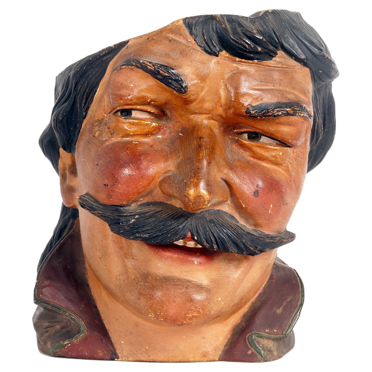 Terracotta vase depicting the head of a man with mustache, Austria 1890. For Sale