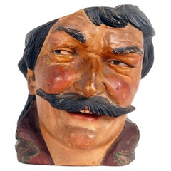 Antique Terracotta vase depicting the head of a man with mustache, Austria 1890.