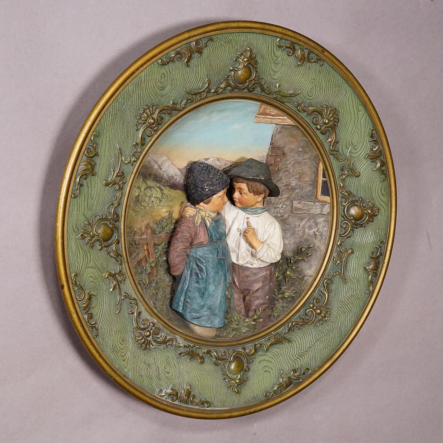 German Terracotta Wall Plate with Lovely Children in Traditional Costumes by Johann Mar For Sale