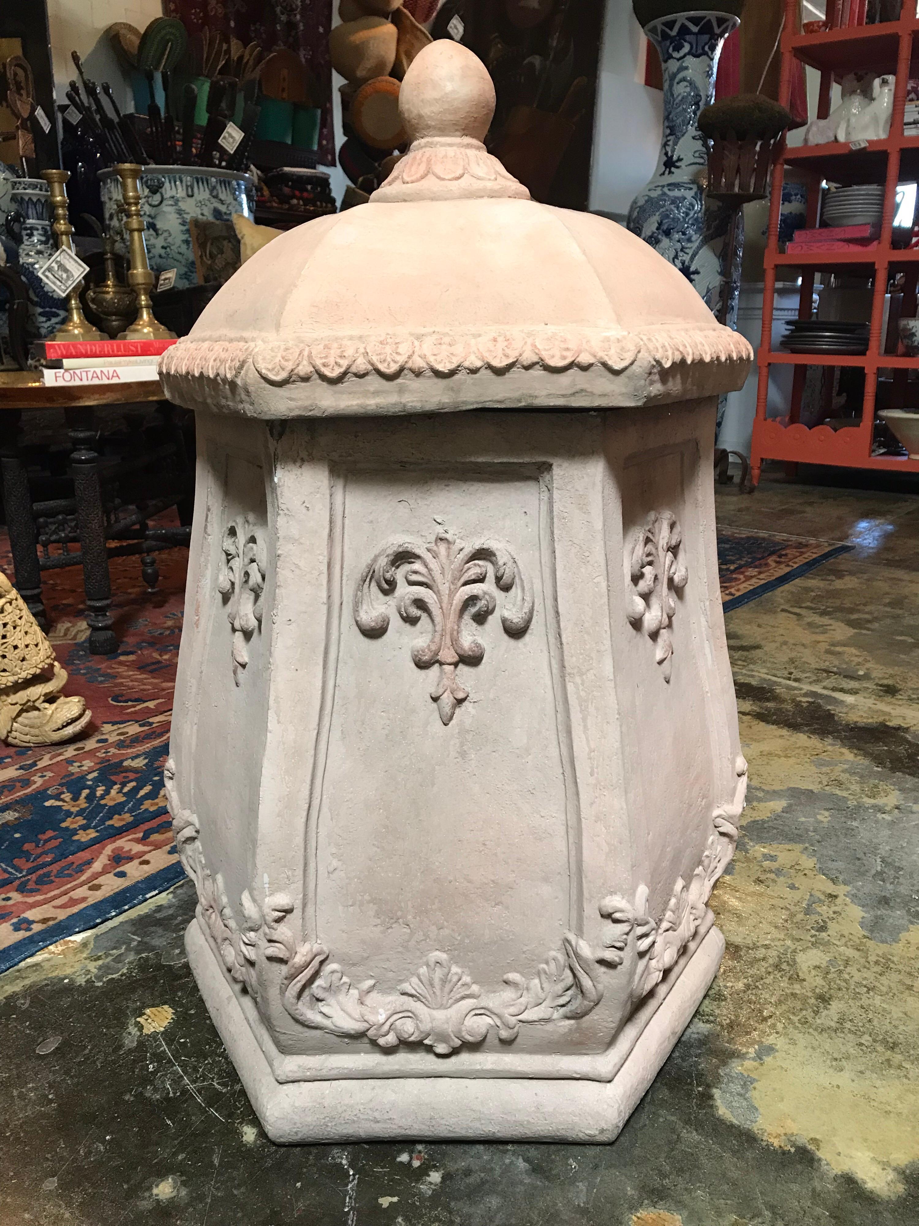 This pair of French waste basket trash cans is made from terracotta and can be used in either an outdoor or an indoor setting. The inside of the wastebaskets have the structural lining to support a bin or trash bag if you so choose.