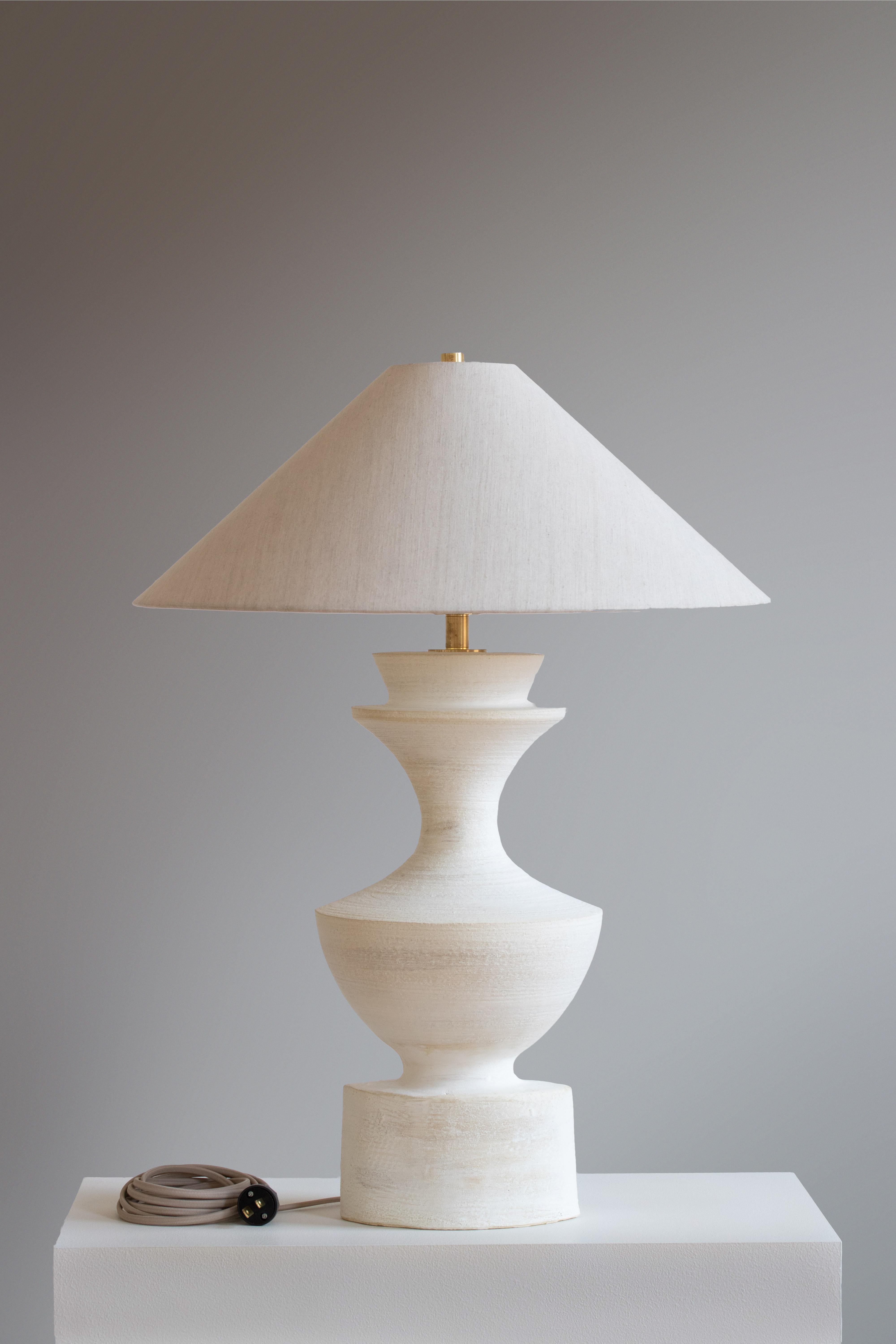 Terrasig Sophia Table Lamp by Danny Kaplan Studio
Dimensions: ⌀ 51 x H 69 cm
Materials: Glazed Ceramic, Unfinished Brass, Linen

This item is handmade, and may exhibit variability within the same piece. We do our best to maintain a consistent