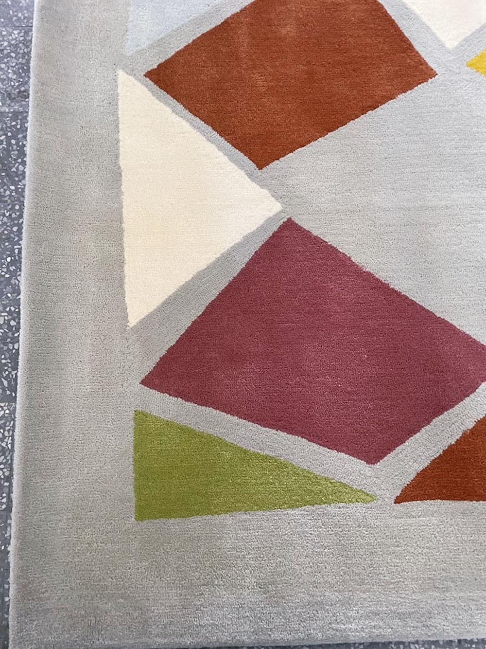 This 170x240 cm never-used rug comes directly from a Swiss manufacturer, ensuring exceptional quality and handcrafted precision.

Add a touch of modern elegance to your home with this stunning hand-stitched vintage rug from Tisca. Made from 100%