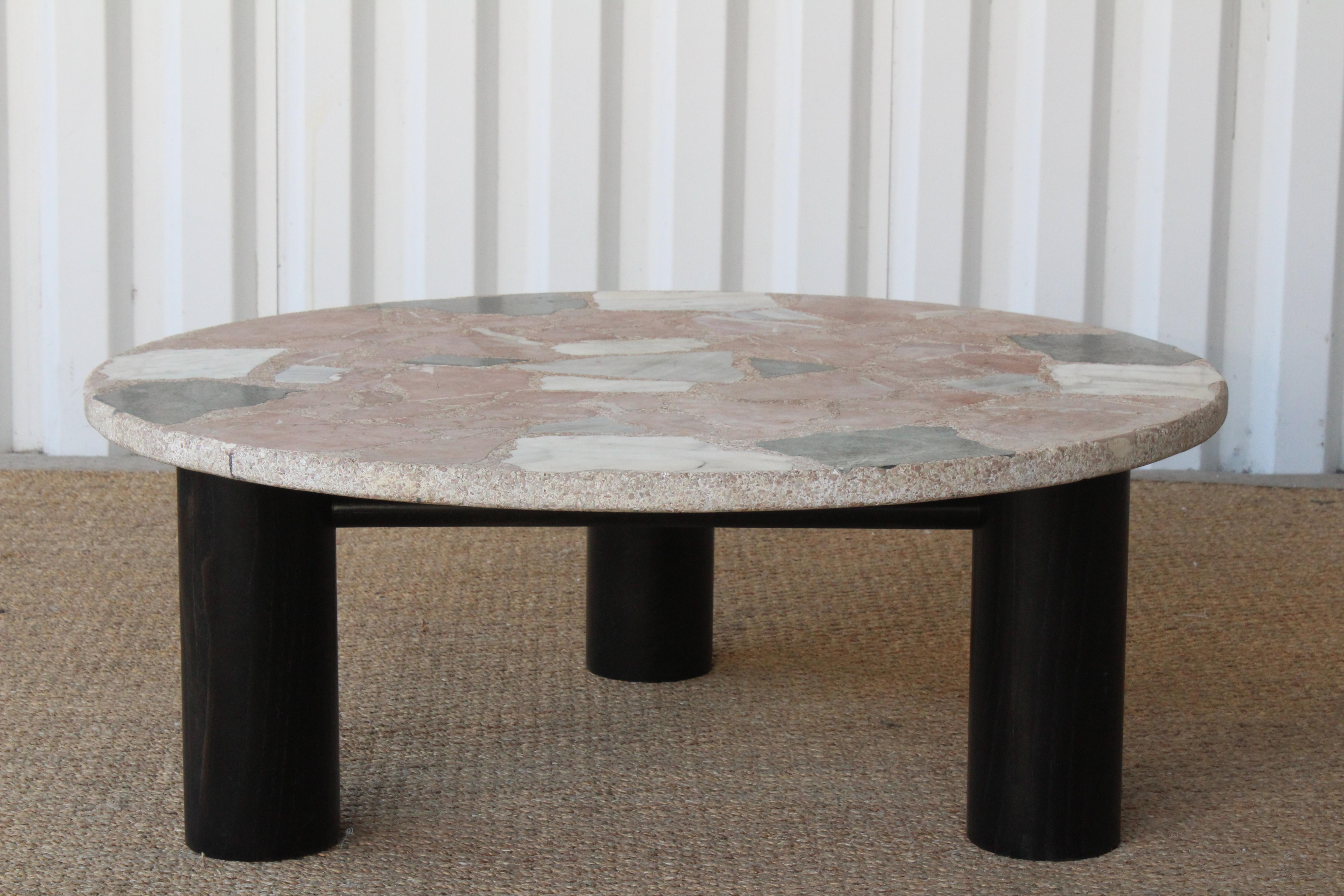 A vintage terrazzo topped coffee table on an oak base. Newly refinished base in satin black. The top is vintage and in overall good condition with minor signs of wear.