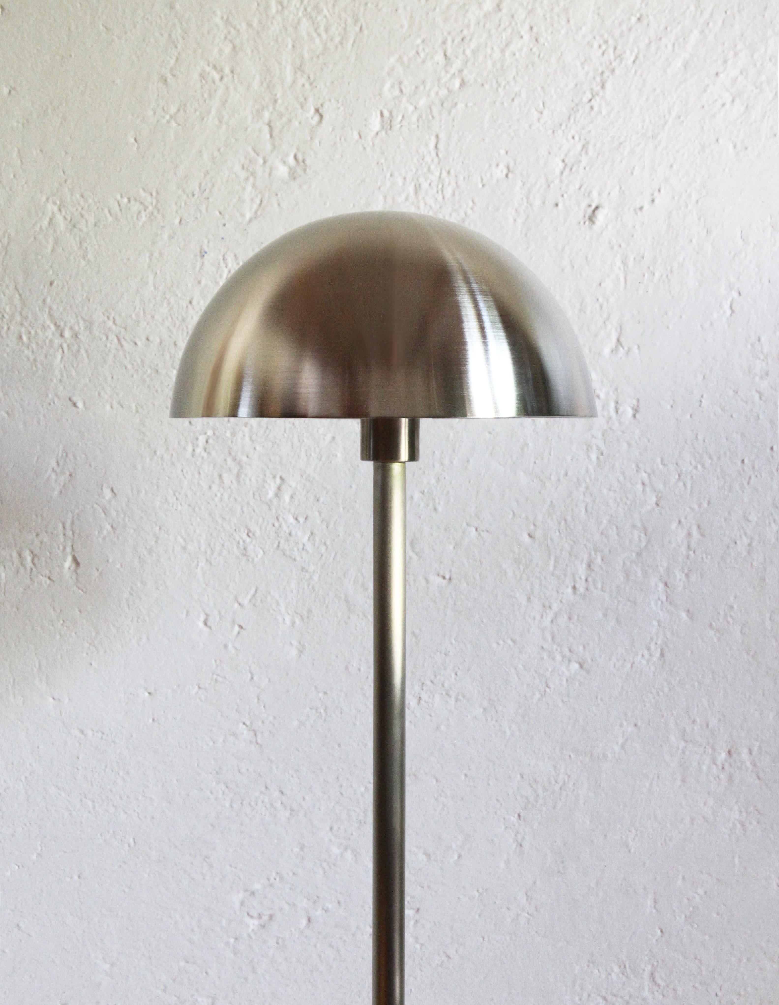 Terrazzo De Pie Abajo is a dimmable floor lamp with dimmer in cable. The solid steel structure is covered in electrostatic metal finish. The base of this lamp is designed with internal steel counterweight, made from terrazzo.

The dome of this