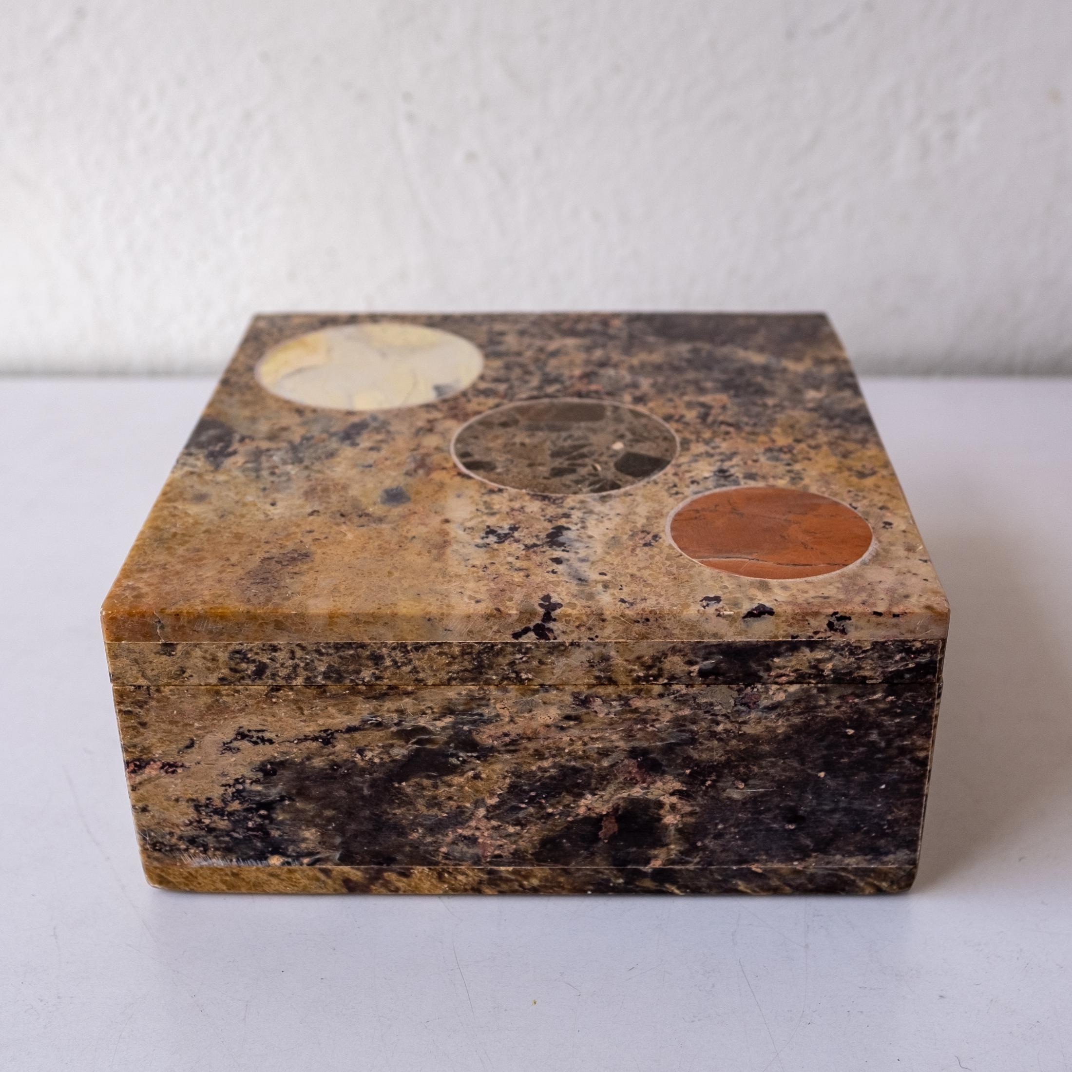 Terrazzo and mixed stone jewelry or trinket box from the 1960s. Brass hinged top. Great mixed stone circular design.