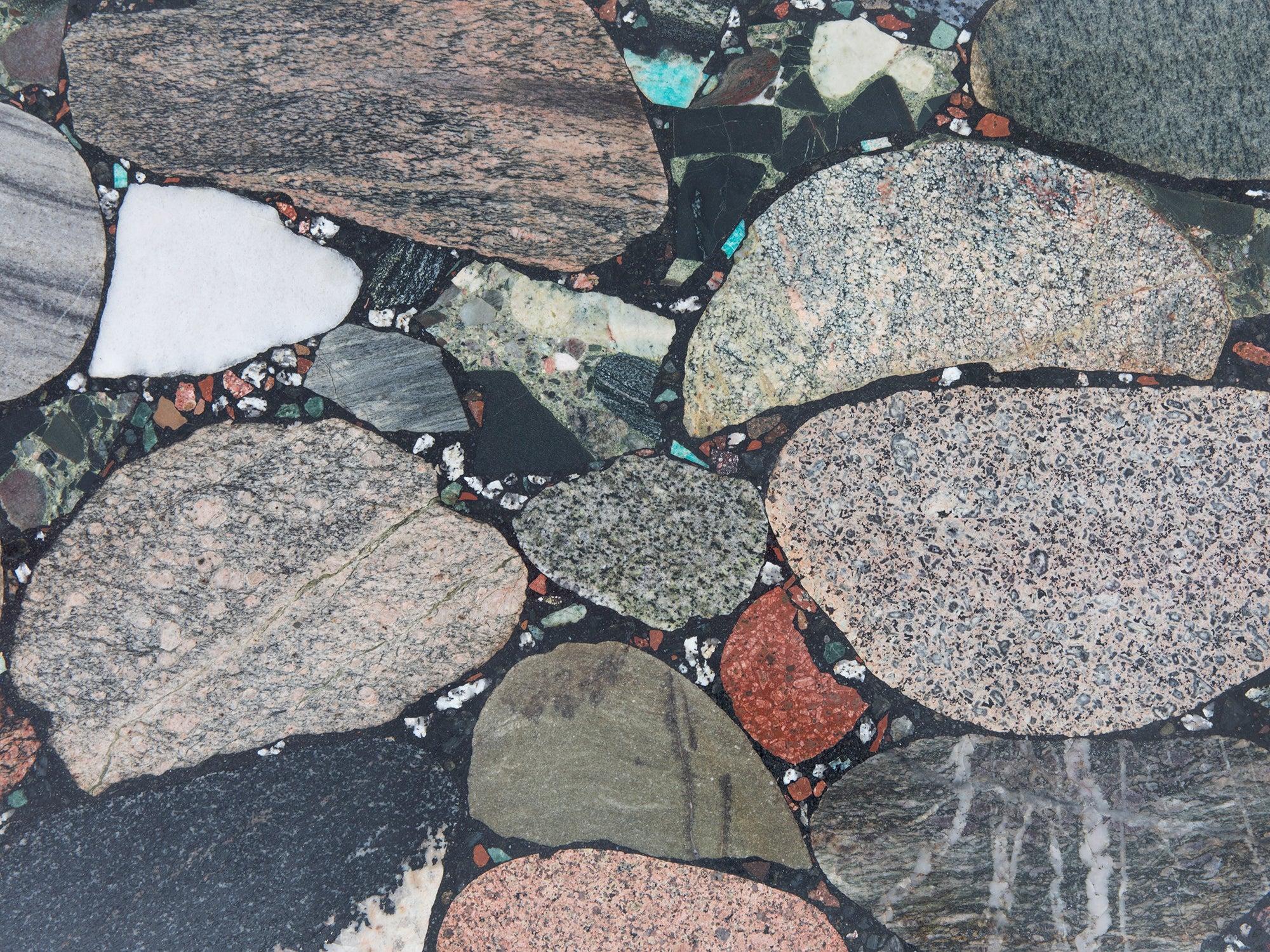 Erling Viksjø was a Norwegian architect and designer best known for his Brutalist architecture and furniture using concrete and stones. This unique rectangular terrazzo coffee table from the 1960s is made of concrete, Norwegian stones, and