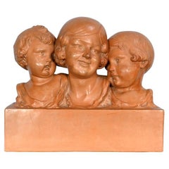 Terracotta patinée, Mère et ses enfants, signée P. Dumont, Art Déco