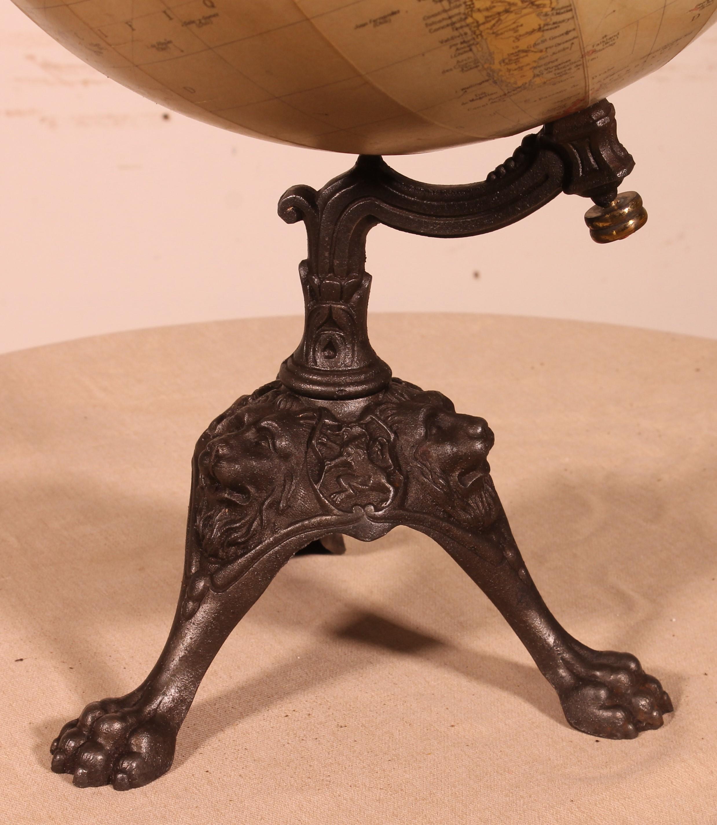 Very beautiful Terrestrial Globe made by Philips Londre based on the maps of Taride Paris Boulevard Saint Germain

The Terrestrial Globe has a very beautiful cast iron base decorated with lion heads and ending with claws
The Globe is in