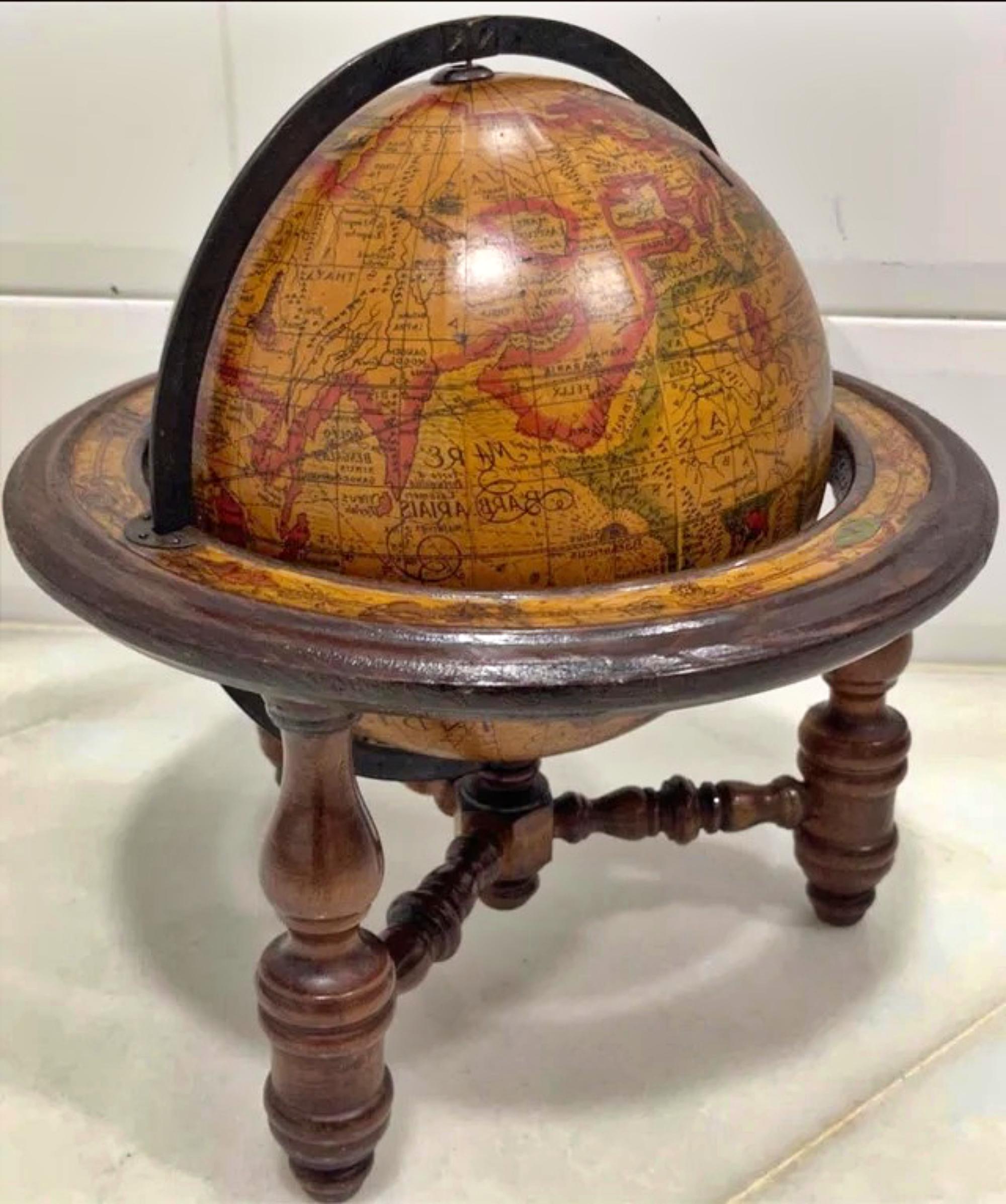 Terrestrial globe early 20th century.
Material: wood.
Measures: 30cm tall.
27 diameter.
Good condition.