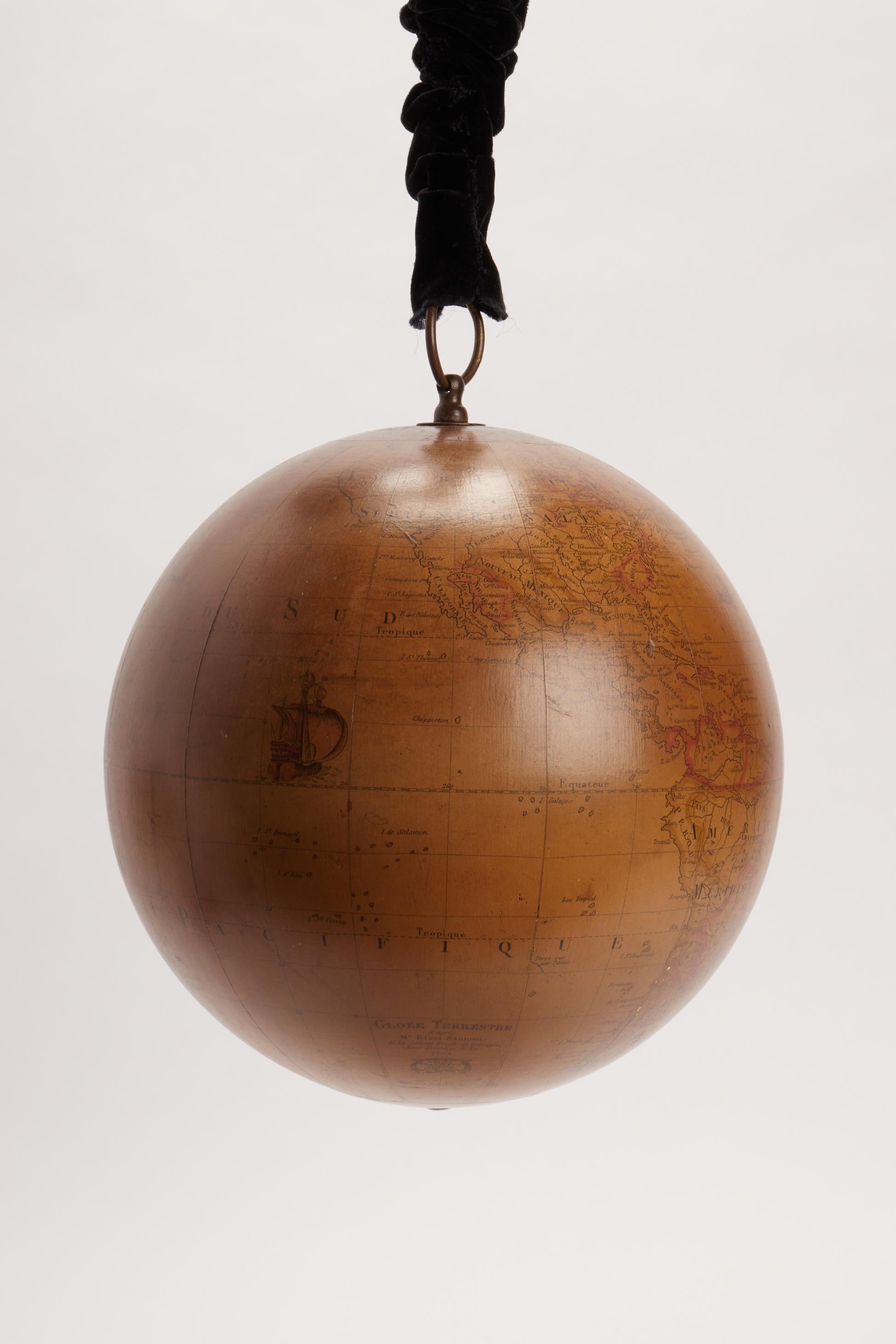 Designed, created, and built to be hanged to the ceiling in order to spin and play with it. Rare are the cases of pre-revolutionary French globes, and most of all the swinging ones. In excellent conditions and original patina, no losses or