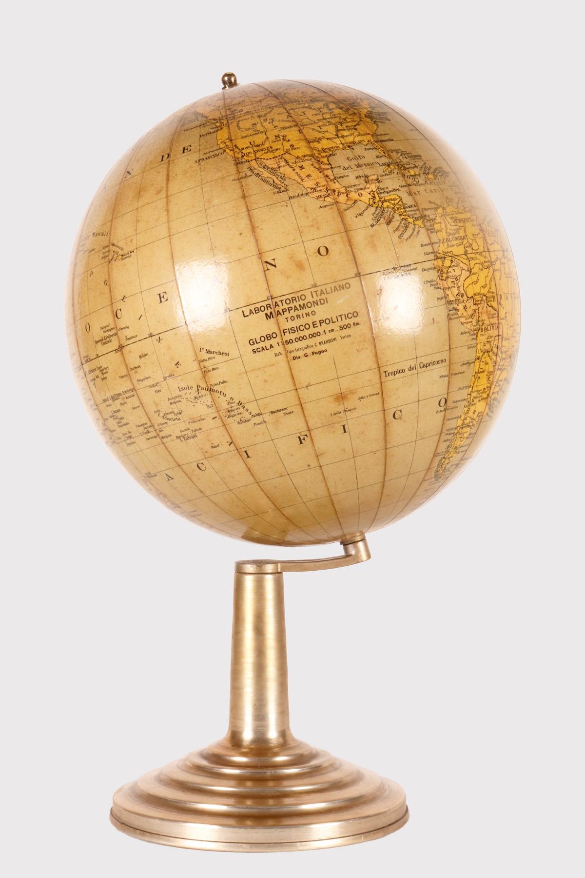 Terrestrial globe, physical and political, in paper mache on a round metal base. Cartographic design G. Pugno, lithographic typography C. Brandoni. Italian globe laboratory, Turin, Italy before 1945.