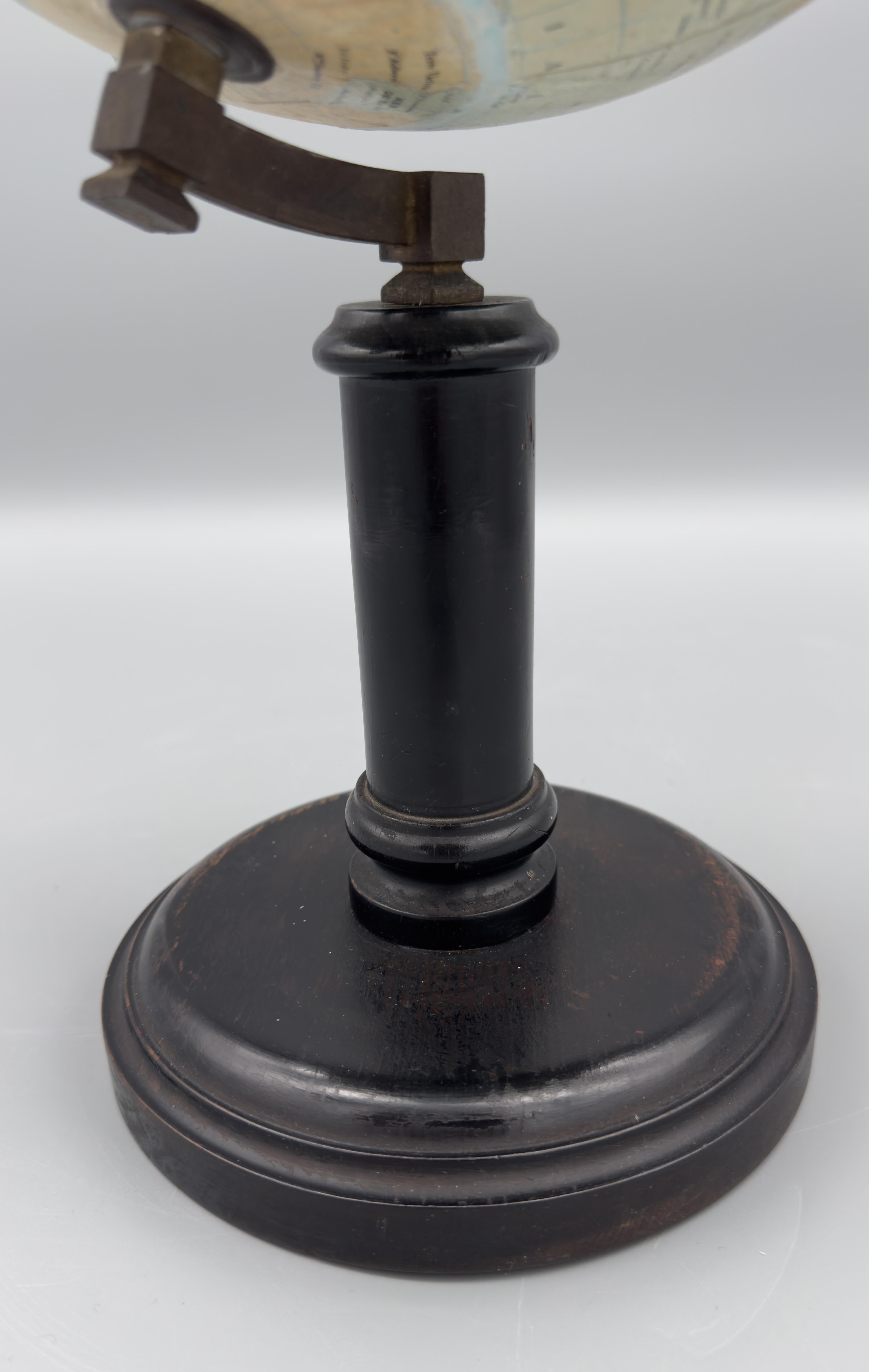 Early 20th Century Terrestrial globe on foot, Editions E. Bertaux, G. Thomas successeur, circa 1900 For Sale
