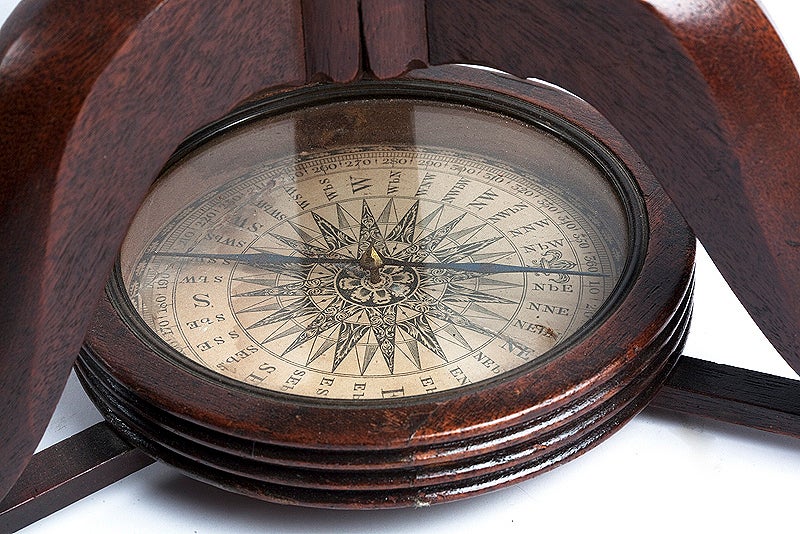 Large 'Papier Machè' terrestrial globe with gores printed in calcography an color finished, on a wooden tripod. One compass joints the three feet. Maker Cary, London, England, 1798.