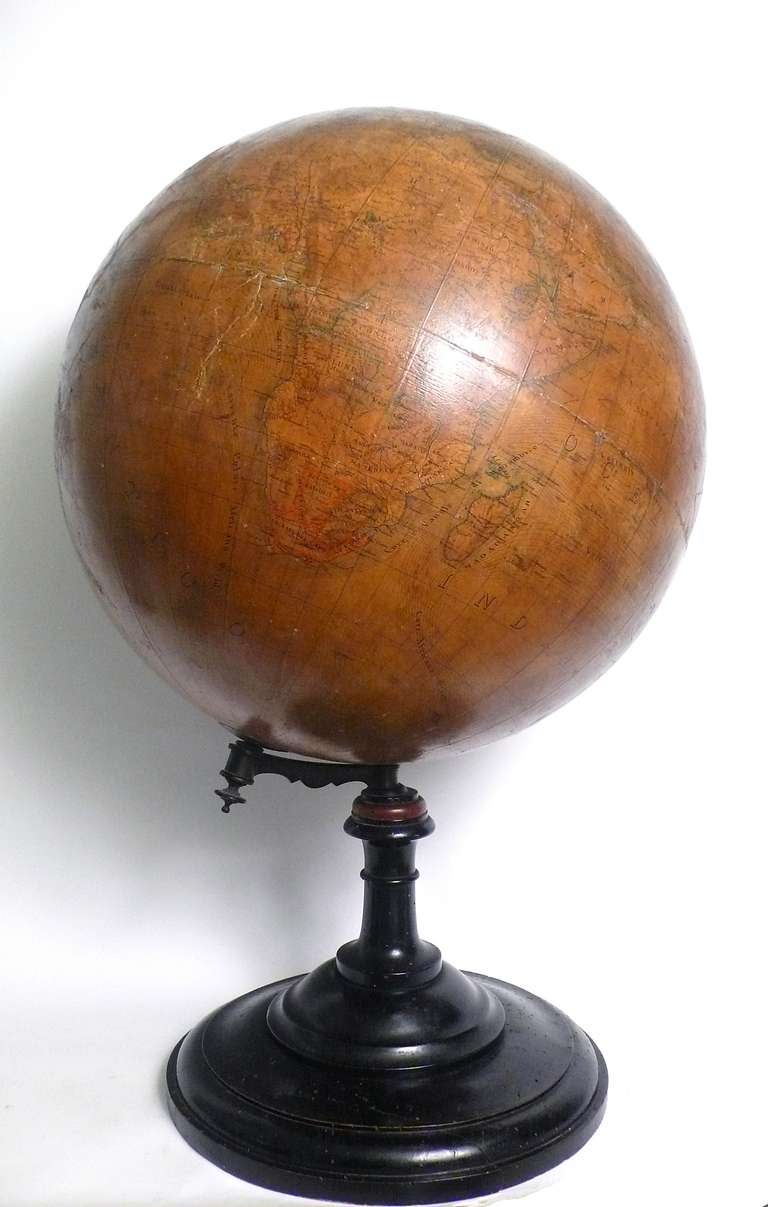 Large terrestrial papier mâché globe, 18 inches. Wooden pedestal. Signed E. Pini Milano, G. Gussoni publisher, Italy, circa 1880.