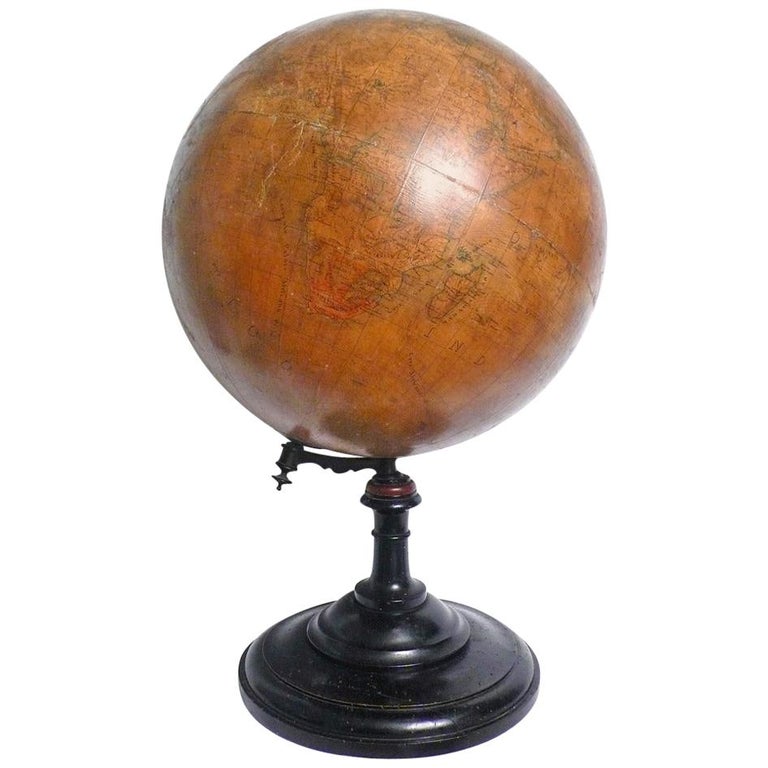 Large terrestrial papier mâché globe, 18 inches. Wooden pedestal. Signed E. Pini Milano, G. Gussoni publisher, Italy, circa 1880.