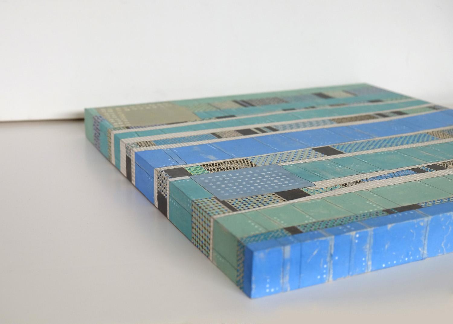 <p>Artist Comments<br>Vertical geometric rows with varying sections in subdued shades of teal, beige and blue. 