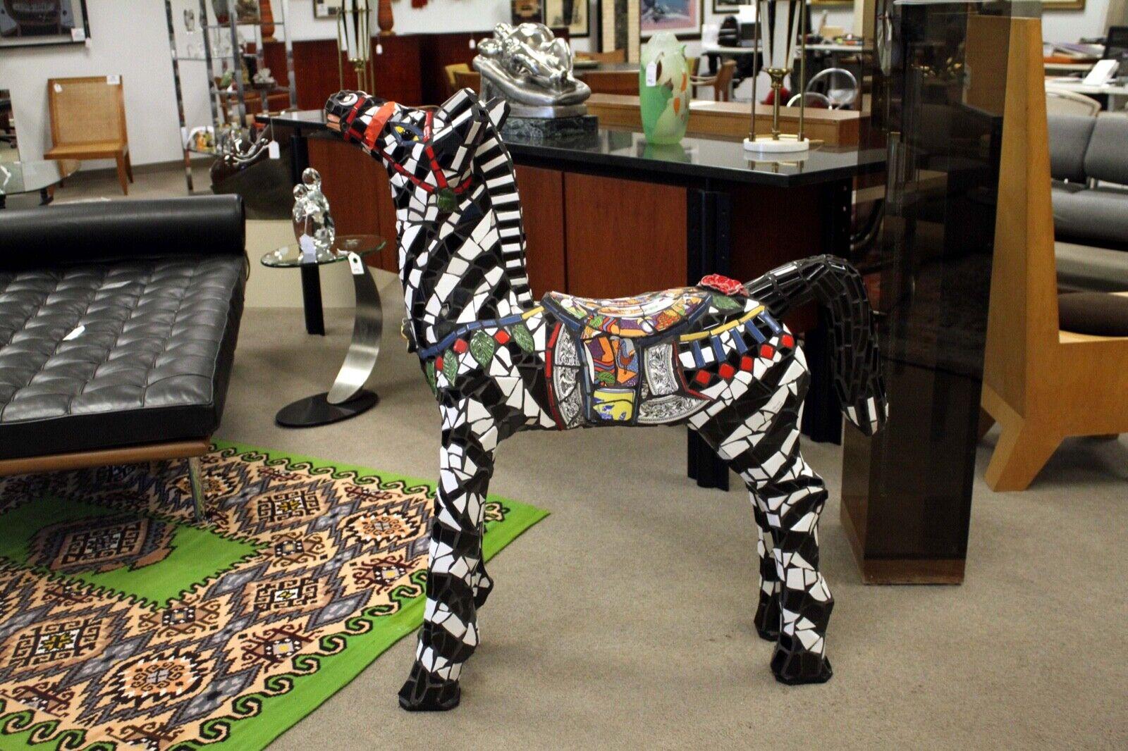 A marvelous mixed media mosaic life-size Zebra by California artist Terrie Kvenild. Signed by the artist. This sculpture makes a unique statement in any modern or contemporary home. Per the artist, 