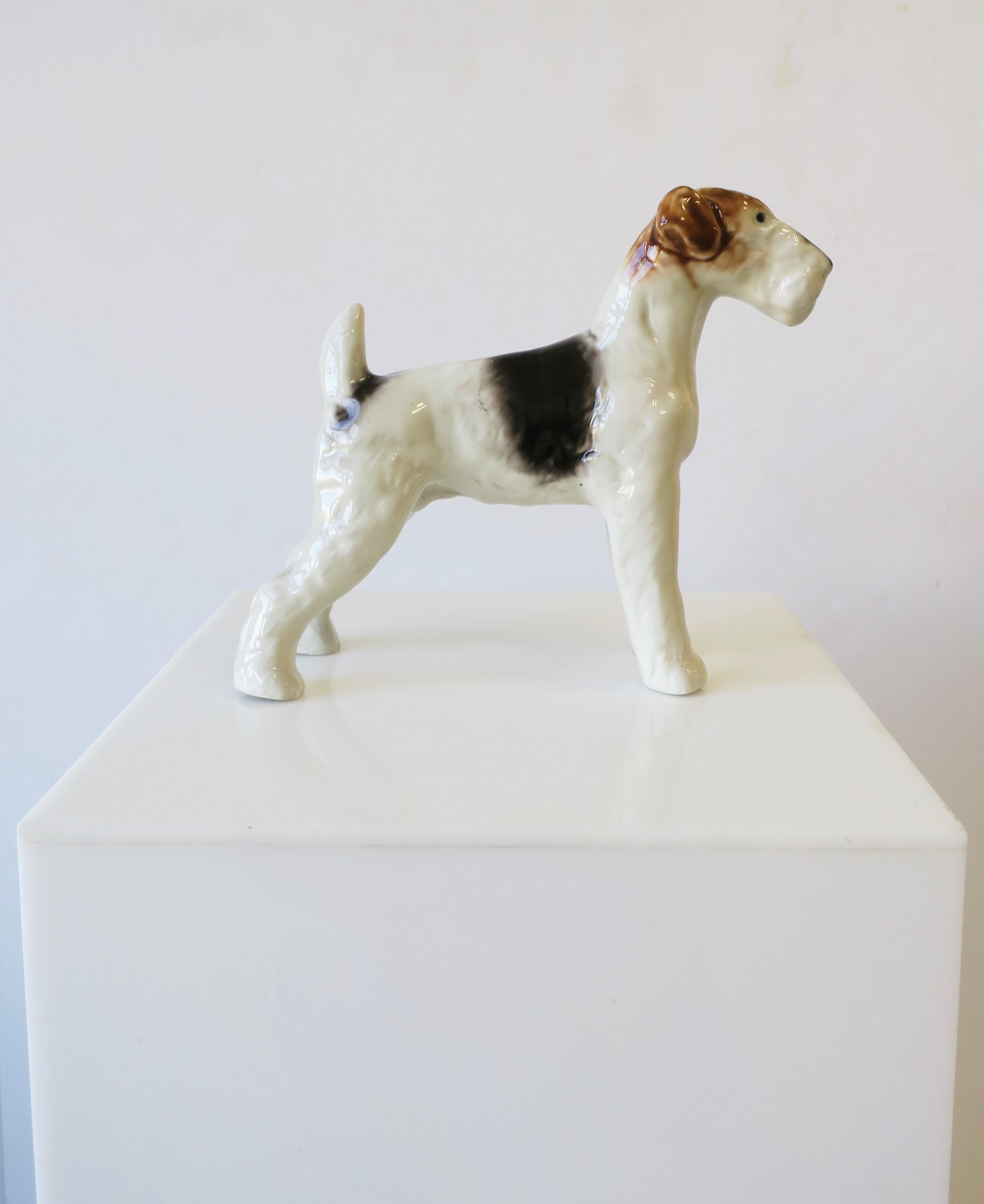 Look at this cutie pie..! Here, a ceramic glazed Wire Fox Terrier dog sculpture piece decorative object. He/She is a nice size measuring: 4
