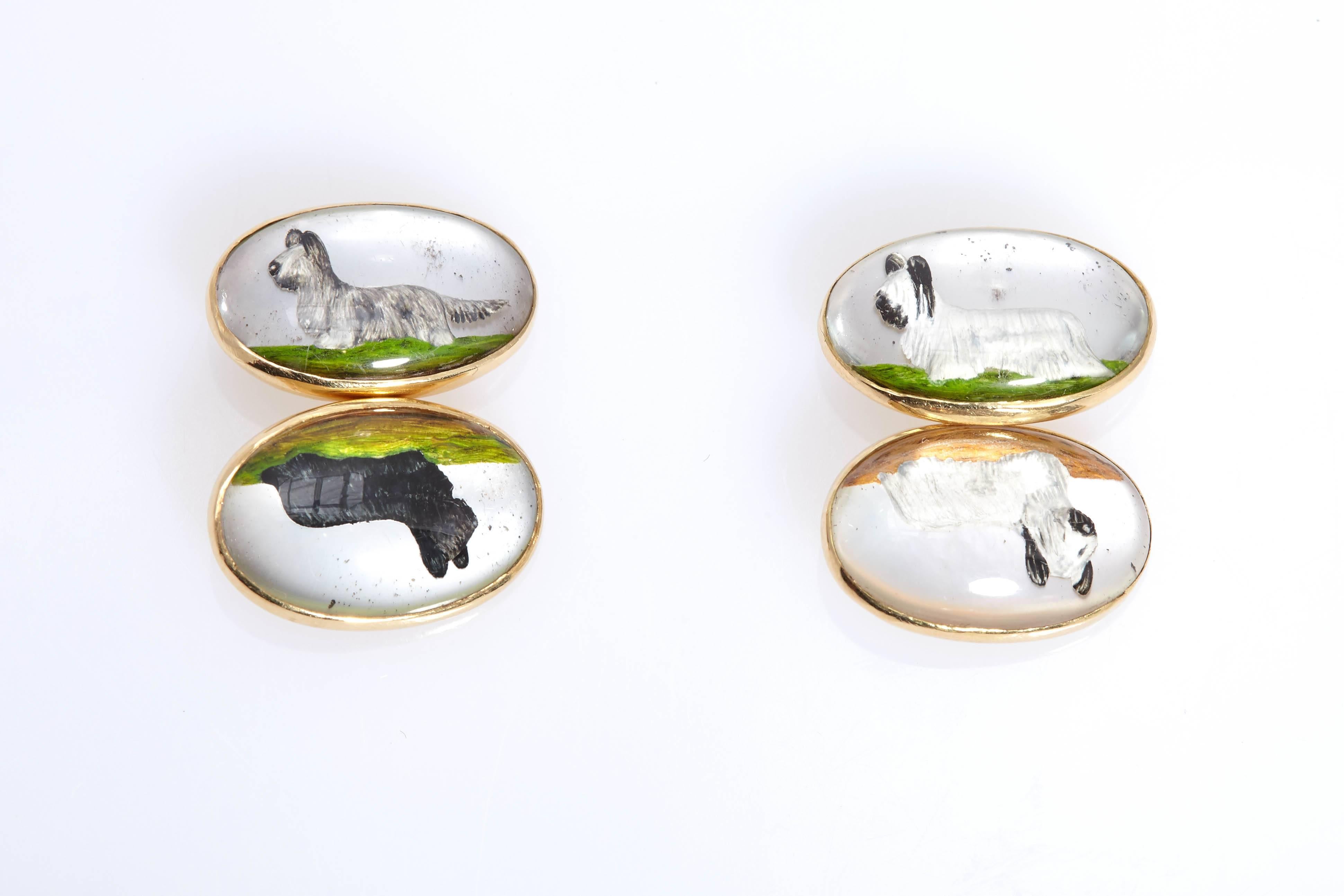 Retro cufflinks in 18kt yellow gold, enamel and reverse crystal, with terrier dog images. Circa 1950