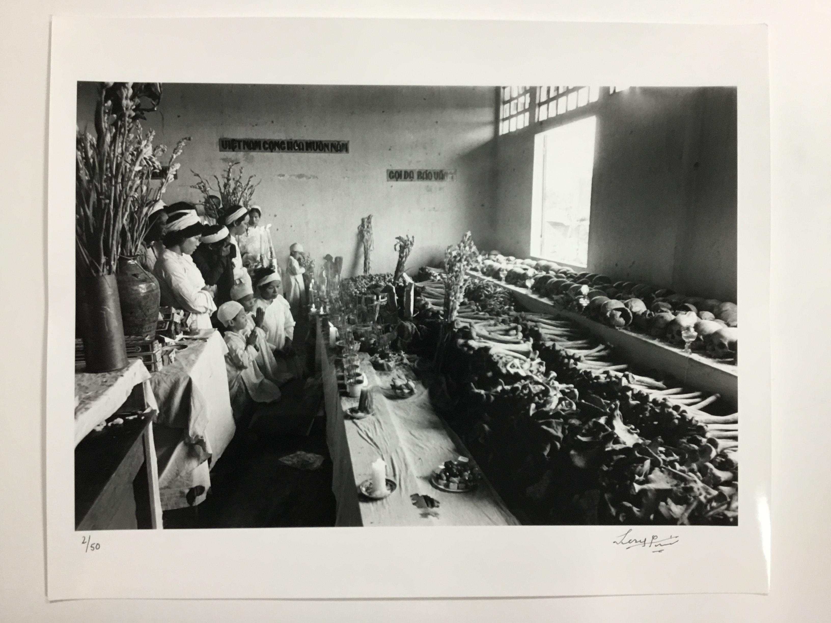 A group of Vietnamese Christians praying at a 'House of Death', Hue, Vietnam, circa 1970. (Photo by Terry Fincher/Hulton Archive/Getty Images)

DETAILS
- Rare signed print, signature on front.
- Hand printed silver gelatin fibre photograph. 
-